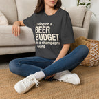 Living on a Beer Budget In A Champagne World T‑Shirt