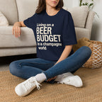 Living on a Beer Budget In A Champagne World T‑Shirt
