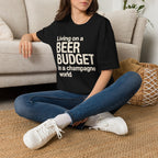 Living on a Beer Budget In A Champagne World T‑Shirt